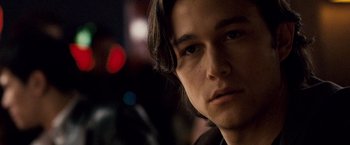 Movie still from “The Lookout” (2007), directed by Scott Frank – A man's face in the dark; Close Up shot, Over the shoulder angle