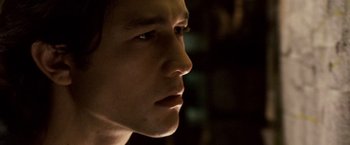 Movie still from “The Lookout” (2007), directed by Scott Frank – A man's face in the dark; Close Up shot, Low angle