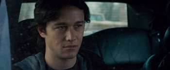 Movie still from “The Lookout” (2007), directed by Scott Frank – A person sitting in a car; Close Up shot, Over the shoulder angle