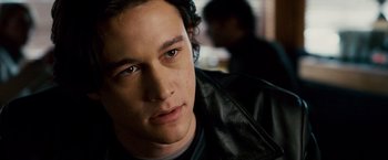 Movie still from “The Lookout” (2007), directed by Scott Frank – A person wearing a leather jacket; Close Up shot, High angle