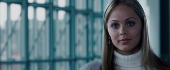 Movie still from “The Lookout” (2007), directed by Scott Frank – A person with long hair; Close Up shot, Over the shoulder angle