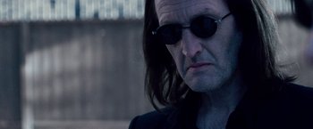 Movie still from “The Lookout” (2007), directed by Scott Frank – A person wearing sunglasses; Close Up shot, Low angle