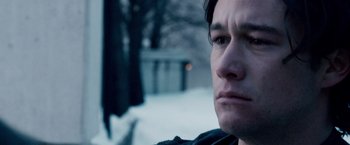 Movie still from “The Lookout” (2007), directed by Scott Frank – A man's face in the snow; Close Up shot, Over the shoulder angle