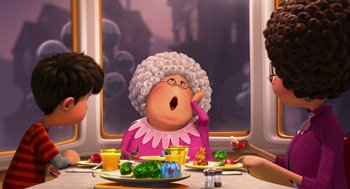 Movie still from “The Lorax” (2012), directed by Chris Renaud – An animated scene of an old woman in a pink dress; Medium shot, Over the shoulder angle