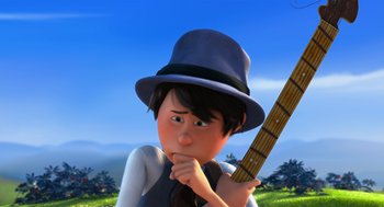 Movie still from “The Lorax” (2012), directed by Chris Renaud – A cartoon of a boy with a hat and holding a guitar; Close Up shot, Low angle