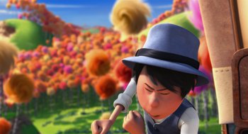 Movie still from “The Lorax” (2012), directed by Chris Renaud – A boy in a blue hat is holding something in his hand; Close Up shot, Low angle