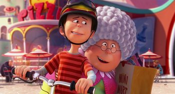 Movie still from “The Lorax” (2012), directed by Chris Renaud – A man riding a bike next to an older woman; Close Up shot, Over the shoulder angle