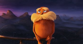 Movie still from “The Lorax” (2012), directed by Chris Renaud – The lorax character sitting on top of a tree branch; Wide shot, Low angle