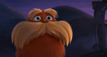 Movie still from “The Lorax” (2012), directed by Chris Renaud – The head of a cartoon character , the lorax; Close Up shot, Low angle