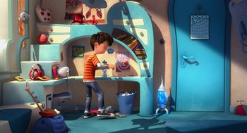 Movie still from “The Lorax” (2012), directed by Chris Renaud – A boy is standing in front of a desk; Wide shot, High angle