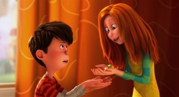Movie still from “The Lorax” (2012), directed by Chris Renaud – A woman is giving a boy a piece of candy; Close Up shot, Over the shoulder angle