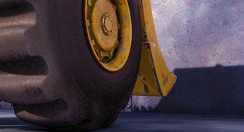 Movie still from “The Lorax” (2012), directed by Chris Renaud – A tire and wheel on the ground; Extreme Close Up shot, Low angle