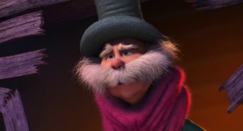 Movie still from “The Lorax” (2012), directed by Chris Renaud – A man with a long beard wearing a top hat and a scarf; Close Up shot, Low angle