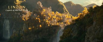 Movie still from “The Lord of the Rings: The Rings of Power” (2022), created by Patrick McKay – An image of a waterfall in the middle of a forest; Extreme Wide shot, High angle