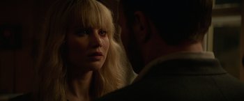 Movie still from “Red Sparrow” (2018), directed by Francis Lawrence – A person looking at the camera; Close Up shot, Over the shoulder angle