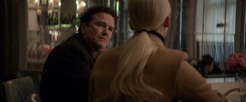 Movie still from “Red Sparrow” (2018), directed by Francis Lawrence – A man and a woman looking at one another in the mirror; Close Up shot, Over the shoulder angle