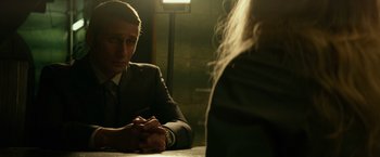 Movie still from “Red Sparrow” (2018), directed by Francis Lawrence – A man sitting at a table in front of a woman; Close Up shot, Over the shoulder angle