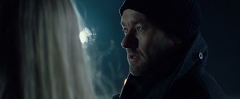 Movie still from “Red Sparrow” (2018), directed by Francis Lawrence – A person wearing a hat; Close Up shot, Over the shoulder angle