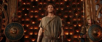 Movie still from “The Lord of the Rings: The Rings of Power” (2022), created by Patrick McKay – A man in a brown shirt and leather armor; Medium shot, Low angle