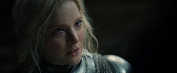 Movie still from “The Lord of the Rings: The Rings of Power” (2022), created by Patrick McKay – A person with long blonde hair; Close Up shot, Over the shoulder angle