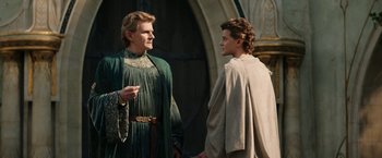 Movie still from “The Lord of the Rings: The Rings of Power” (2022), created by Patrick McKay – Two men in medieval garb talking to each other; Medium shot, Over the shoulder angle