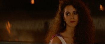 Movie still from “The Lost Boys” (1987), directed by Joel Schumacher – A person with long hair; Close Up shot, Over the shoulder angle