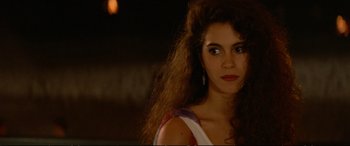 Movie still from “The Lost Boys” (1987), directed by Joel Schumacher – A person with long hair; Close Up shot, Over the shoulder angle