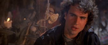 Movie still from “The Lost Boys” (1987), directed by Joel Schumacher – A person wearing a leather jacket; Close Up shot, Over the shoulder angle