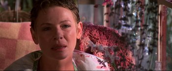 Movie still from “The Lost Boys” (1987), directed by Joel Schumacher – A person with short hair; Close Up shot, Over the shoulder angle