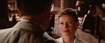 Movie still from “The Lost Boys” (1987), directed by Joel Schumacher – A man and a woman talking to each other; Close Up shot, Over the shoulder angle