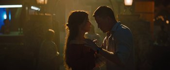 Movie still from “The Lost City” (2022), directed by Aaron Nee – A man and a woman dancing in a room; Close Up shot, Low angle