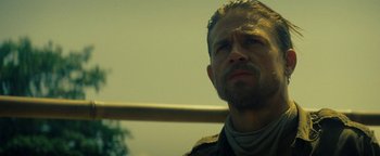 Movie still from “The Lost City of Z” (2016), directed by James Gray – A person with a beard; Close Up shot, Over the shoulder angle