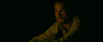 Movie still from “The Lost City of Z” (2016), directed by James Gray – A person wearing a shirt and a tie; Close Up shot, Low angle