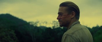 Movie still from “The Lost City of Z” (2016), directed by James Gray – A person wearing a shirt; Close Up shot, Over the shoulder angle