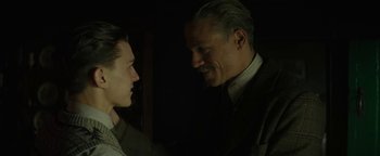 Movie still from “The Lost City of Z” (2016), directed by James Gray – A man and a woman talking to each other; Close Up shot, Over the shoulder angle