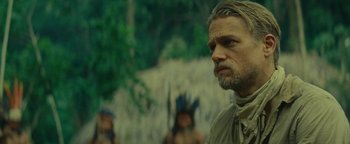 Movie still from “The Lost City of Z” (2016), directed by James Gray – A person with a beard; Close Up shot, Over the shoulder angle