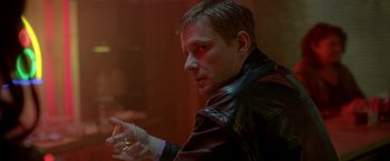 Movie still from “The Lure” (2015), directed by Agnieszka Smoczynska – A person holding a glass of wine; Close Up shot, Over the shoulder angle