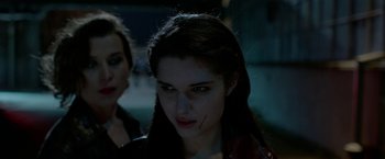 Movie still from “The Lure” (2015), directed by Agnieszka Smoczynska – A woman with red lipstick on her mouth; Close Up shot, Over the shoulder angle