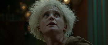 Movie still from “The Lure” (2015), directed by Agnieszka Smoczynska – A person wearing a white wig; Close Up shot, Low angle