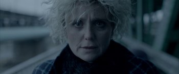 Movie still from “The Lure” (2015), directed by Agnieszka Smoczynska – A person wearing a black jacket; Close Up shot, Low angle