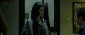 Movie still from “The Lure” (2015), directed by Agnieszka Smoczynska – A woman with wet hair standing in a room; Close Up shot, Over the shoulder angle