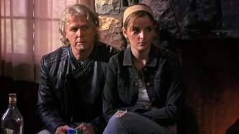Movie still from “The Man from Earth” (2007), directed by Richard Schenkman – A man and a woman sitting next to each other; Close Up shot, Over the shoulder angle