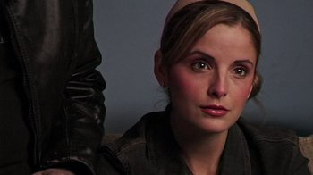 Movie still from “The Man from Earth” (2007), directed by Richard Schenkman – A person wearing a black jacket; Close Up shot, Over the shoulder angle