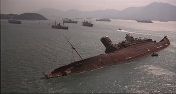 Movie still from “The Man with the Golden Gun” (1974), directed by Guy Hamilton – Several ships in the water near the shore; Extreme Wide shot, High angle