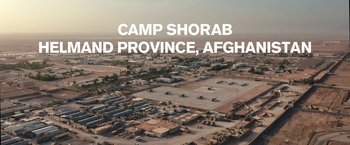 Movie still from “Retrograde” (2022), directed by Matthew Heineman – An aerial view of camp shorab in afghanistan; Extreme Wide shot, High angle