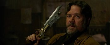 Movie still from “The Man with the Iron Fists” (2012), directed by RZA – A person holding a sword; Close Up shot, Low angle