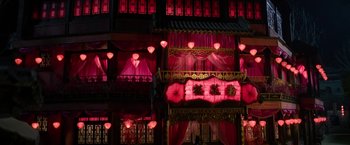 Movie still from “The Man with the Iron Fists” (2012), directed by RZA – A building with a lot of lights on the ceiling; Extreme Wide shot, Low angle