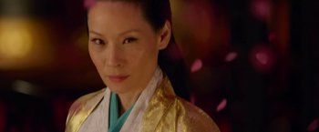 Movie still from “The Man with the Iron Fists” (2012), directed by RZA – A person wearing a robe; Close Up shot, Over the shoulder angle