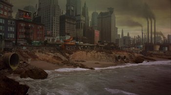 Movie still from “The Mask” (1994), directed by Chuck Russell – An image of an ocean with a city in the background; Extreme Wide shot, High angle