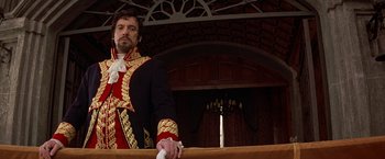 Movie still from “The Mask of Zorro” (1998), directed by Martin Campbell – A man in a military uniform standing in front of an altar; Medium shot, Low angle